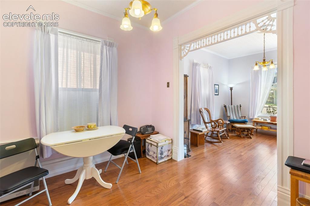 Image 12 of 29: Bring in your full formal dining set and complete the historic style. 