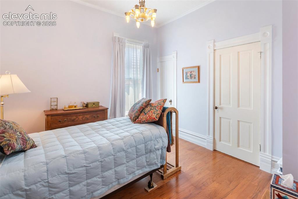 Image 19 of 29: Alley side bedroom for quiet nights.