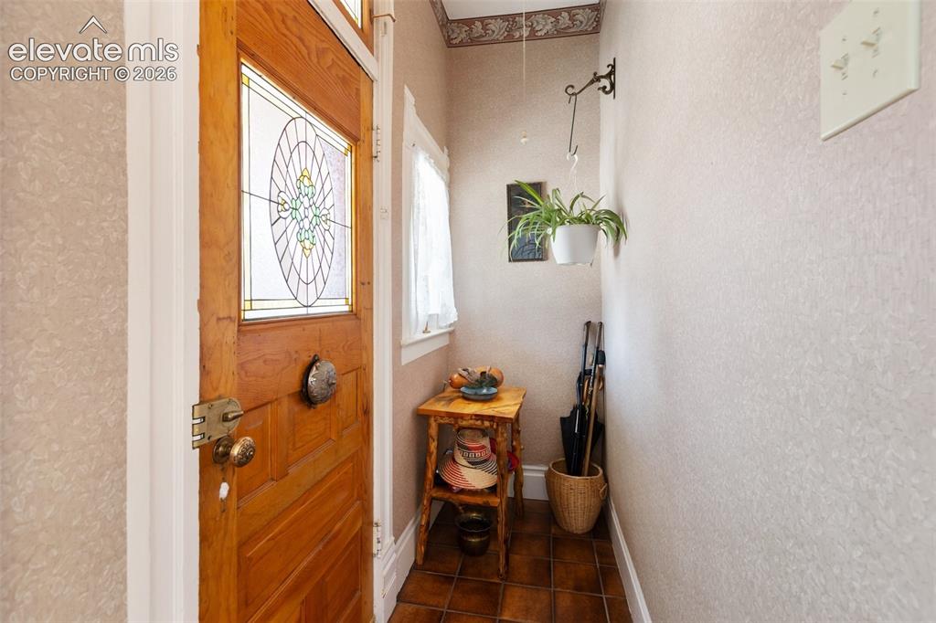 Image 4 of 29: Classic entry with old world touches. 