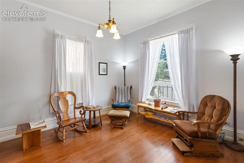 Image 6 of 29: Natural light fills the living room. 