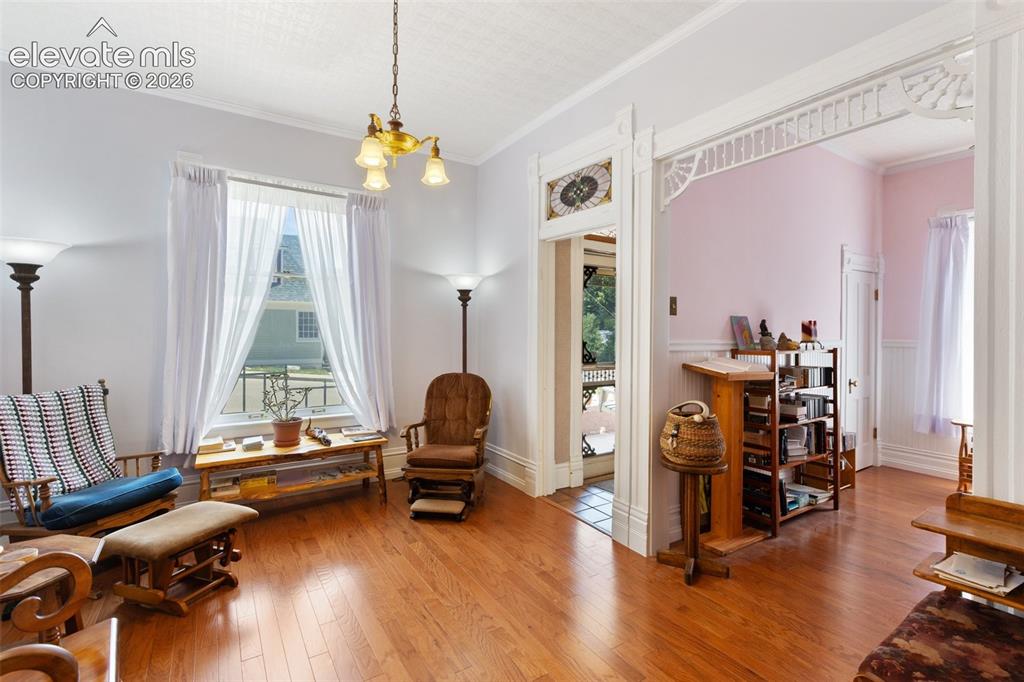 Image 8 of 29: Warm wood floors and authentic Victorian style. 