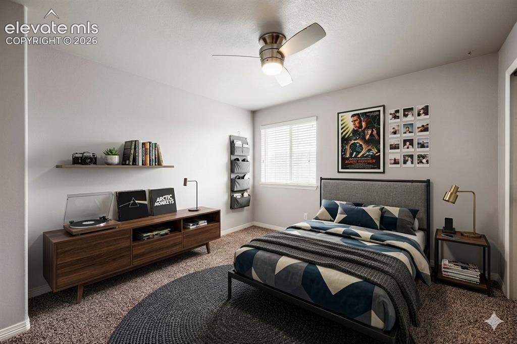 Image 20 of 41: Room featuring a ceiling fan with integrated lighting, a window with horizo