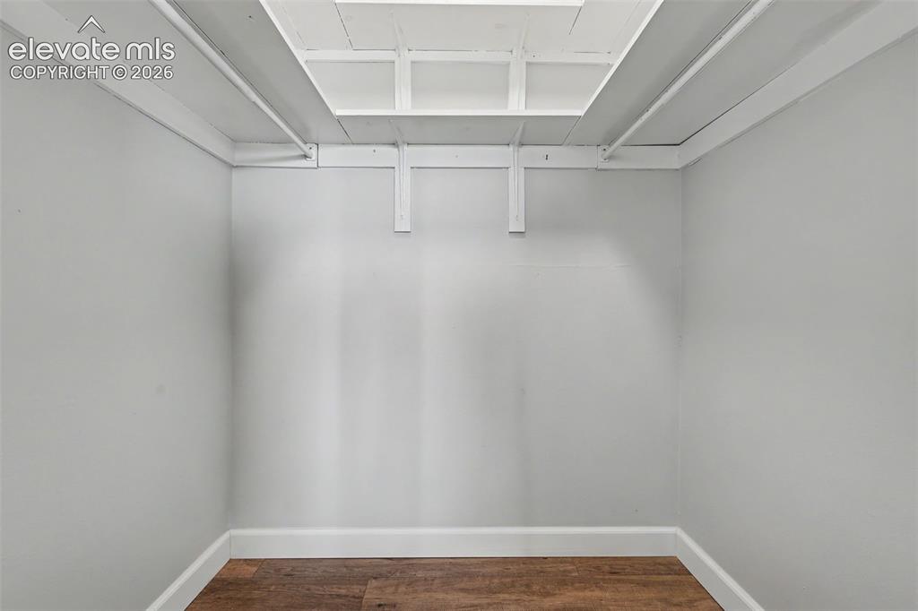 Image 20 of 25: The bedroom boasts a walk-in closet!