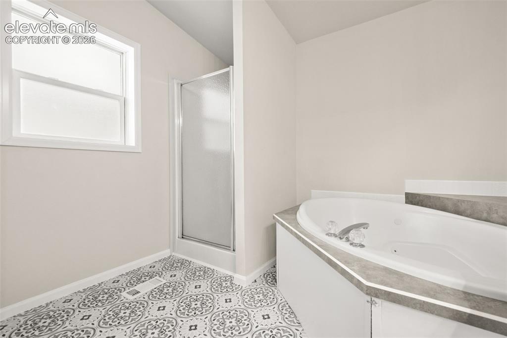 Image 19 of 36: Master Bathroom
