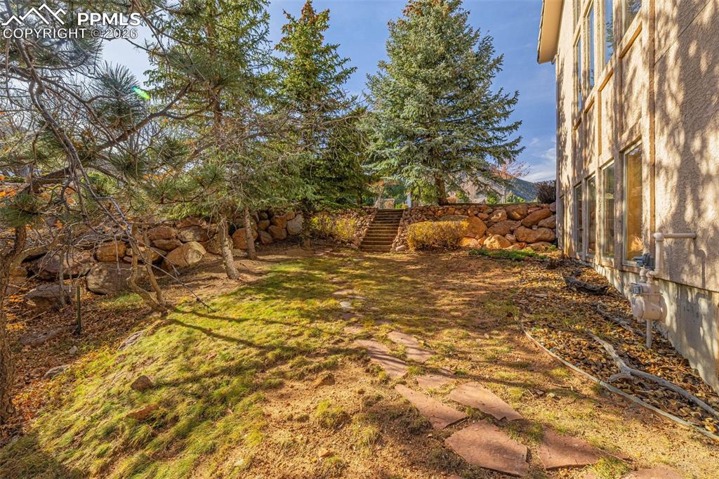Image 46 of 47: View of yard featuring stairs