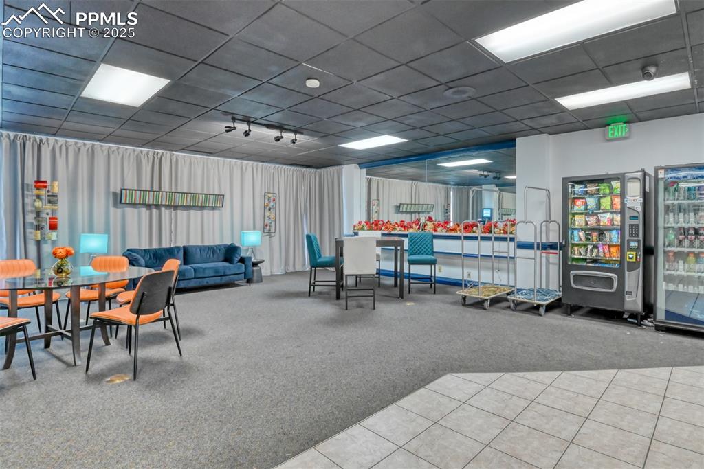 Image 30 of 44: Lobby ~ Main level lounge area