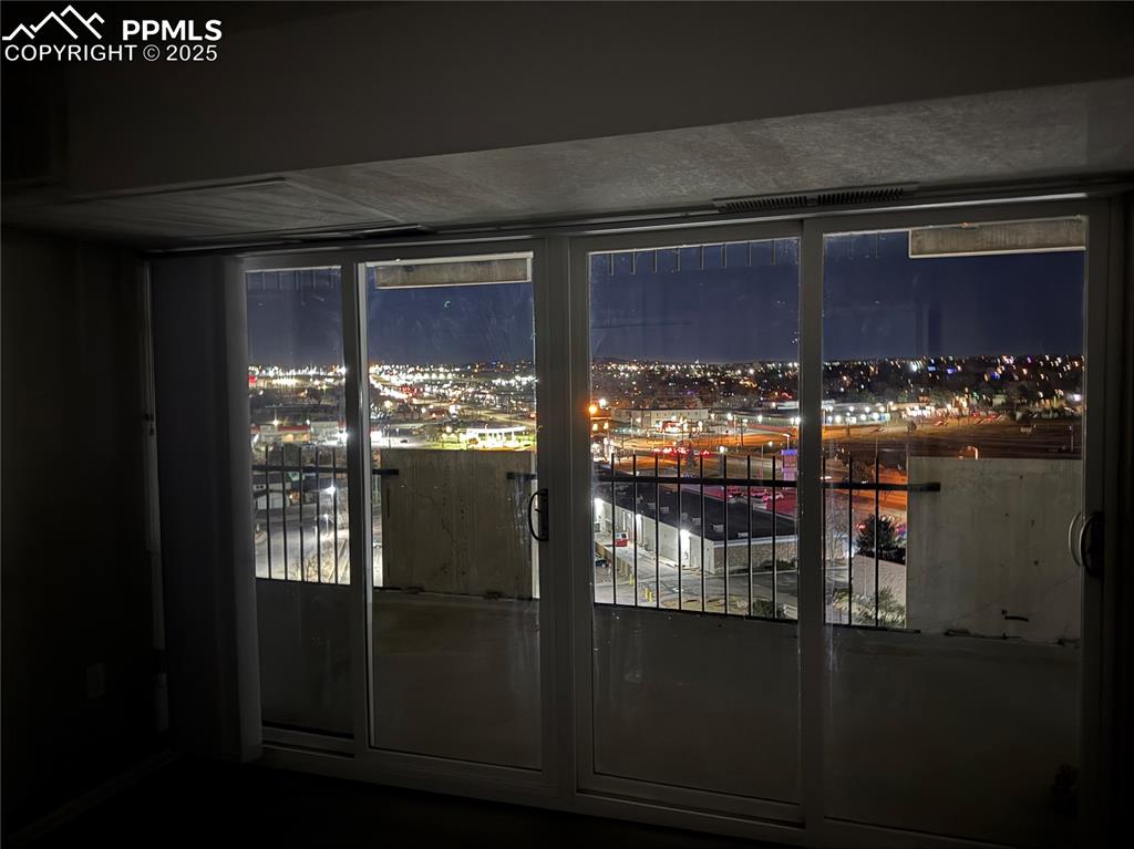 Image 42 of 44: Primary bedroom view in evening