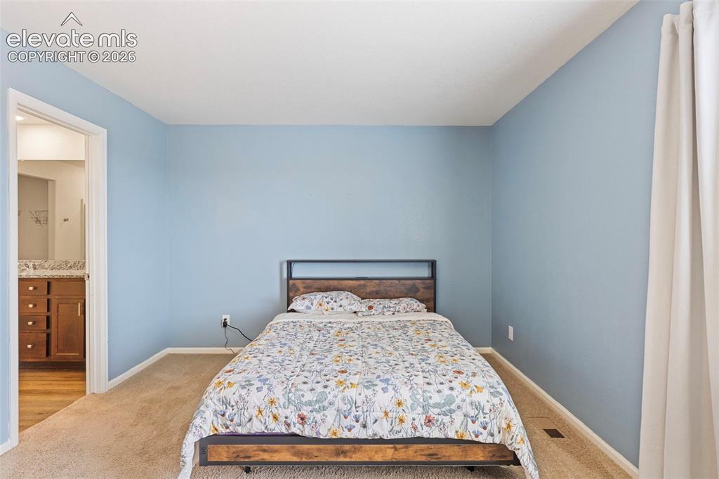 Image 14 of 41: Master Bedroom