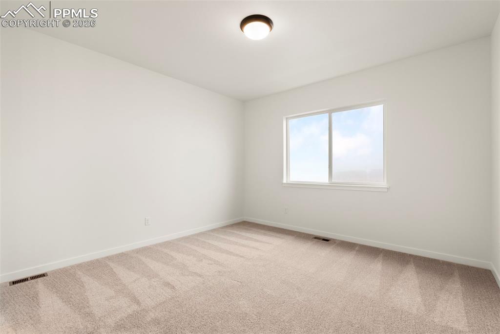 Image 10 of 15: Master Bedroom