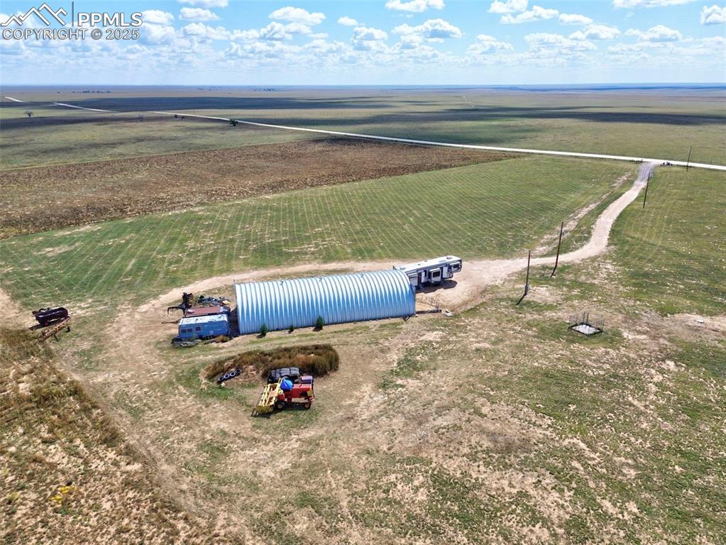 Image 6 of 31: Aerial view of sparsely populated area with farmland