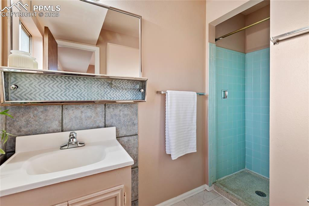 Image 22 of 38: Primary 3/4 bathroom adjoins the primary bedroom