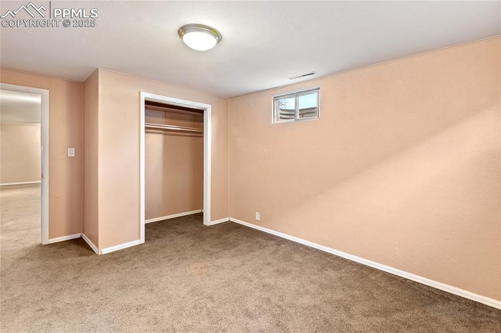 Image 29 of 38: 4th bedroom is located in the basement