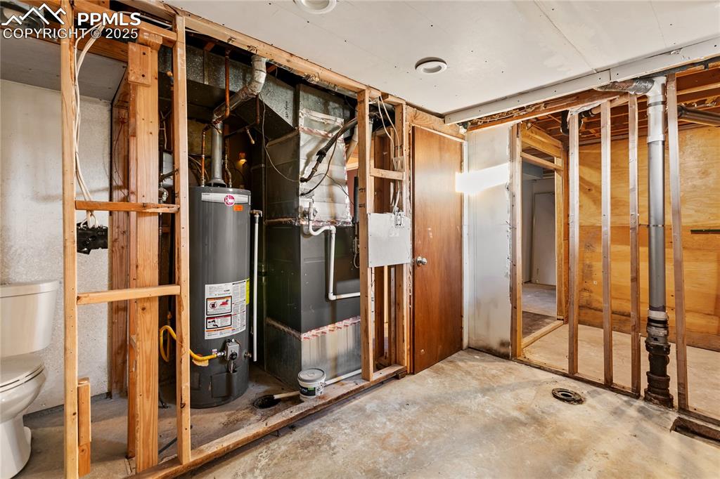 Image 34 of 38: Furnace replaced in 2019, water heater replaced in 2017. This basement roo