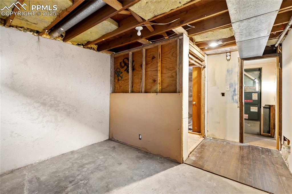 Image 38 of 38: bonus room framed to be a future bedroom/office including a spacious closet