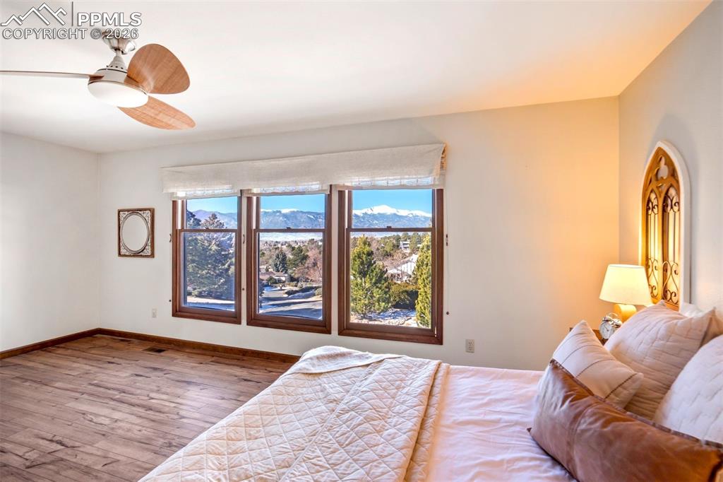 Image 26 of 50: View of Pikes Peak from Primary Bedroom
