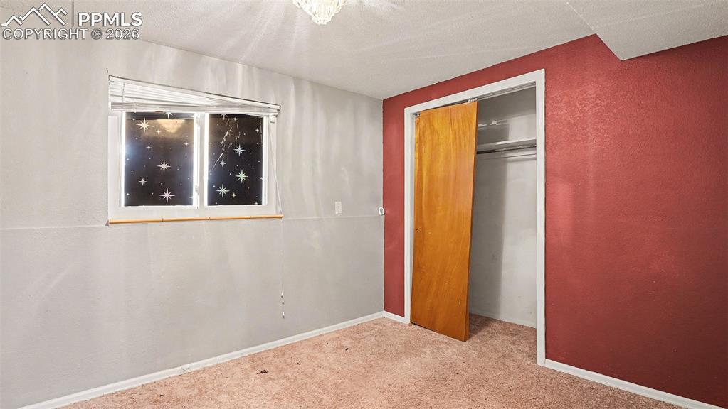 Image 8 of 15: Bedroom