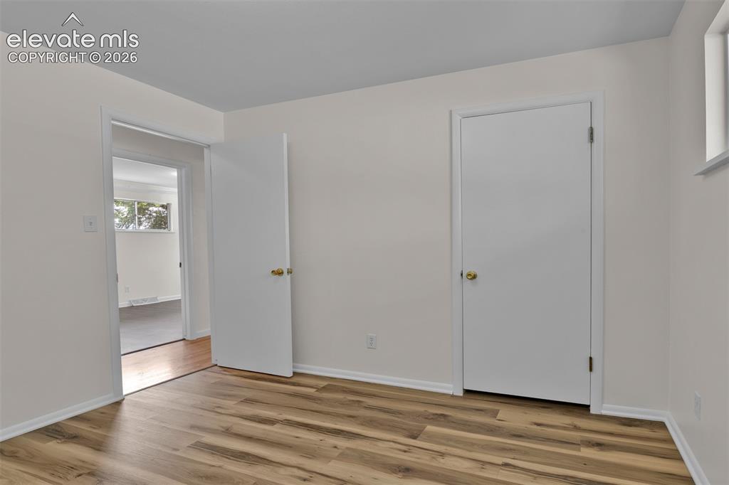 Image 16 of 40: Updated Full bathroom on main level with convenient separate vanity area.