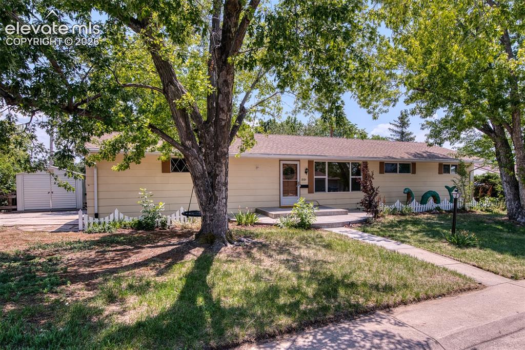 Image 2 of 40: Welcome home - This home greets you with curb appeal and mature trees.