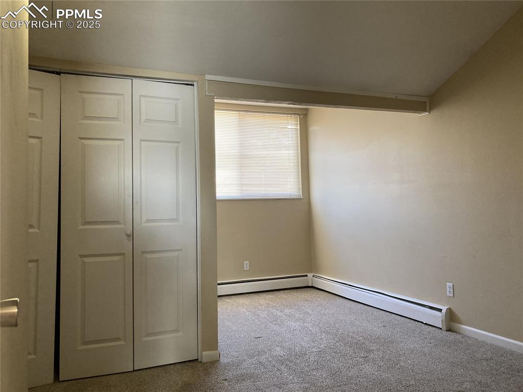 Image 9 of 13: Primary bedroom