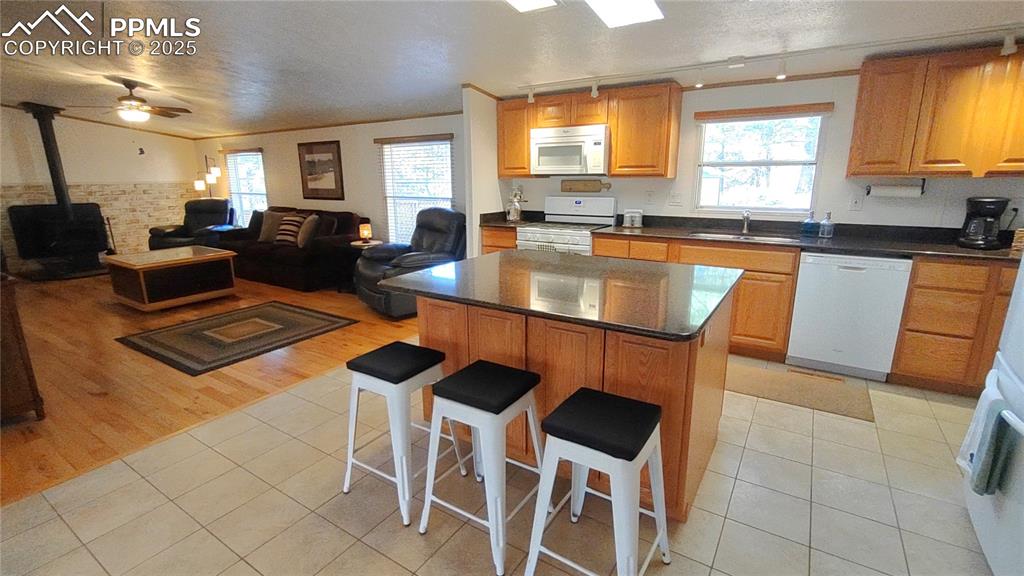 Image 15 of 42: Kitchen is open to the family room for easy entertaining & visiting.