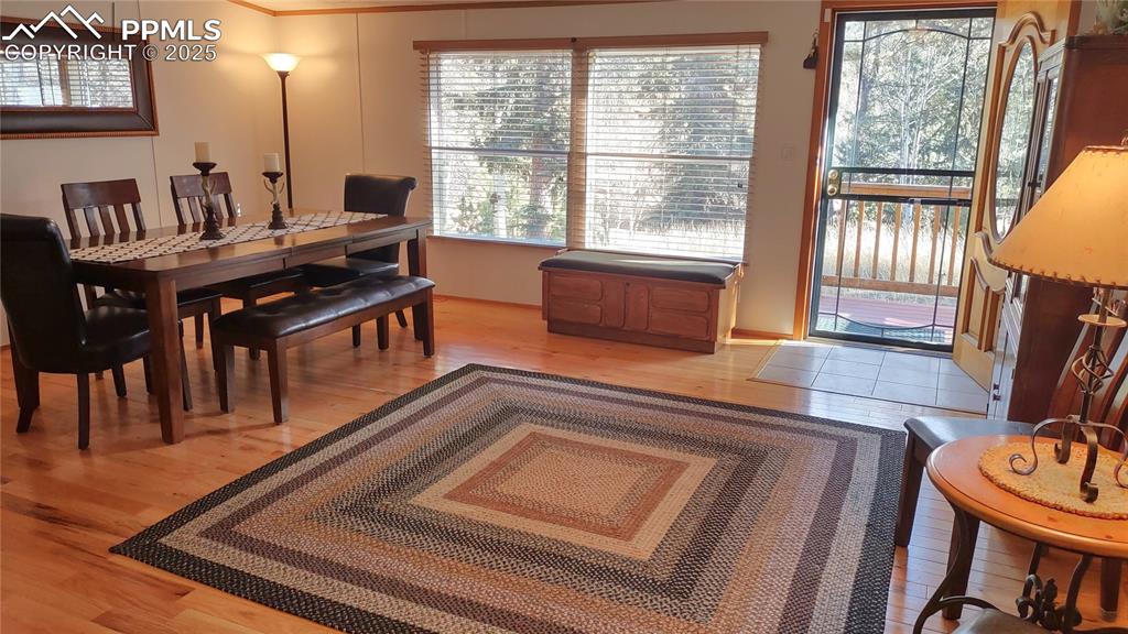 Image 6 of 42: Enter into the living room, which can also double as a formal dining room.