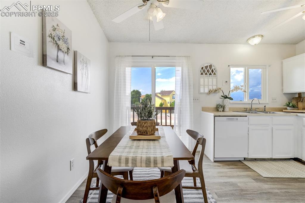 Image 12 of 33: Dining walk-out to rear deck