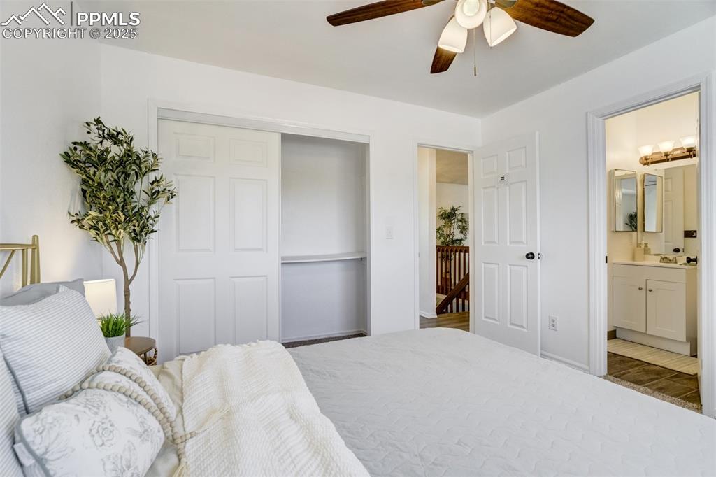 Image 15 of 33: Primary bedroom as private access to main level bathroom