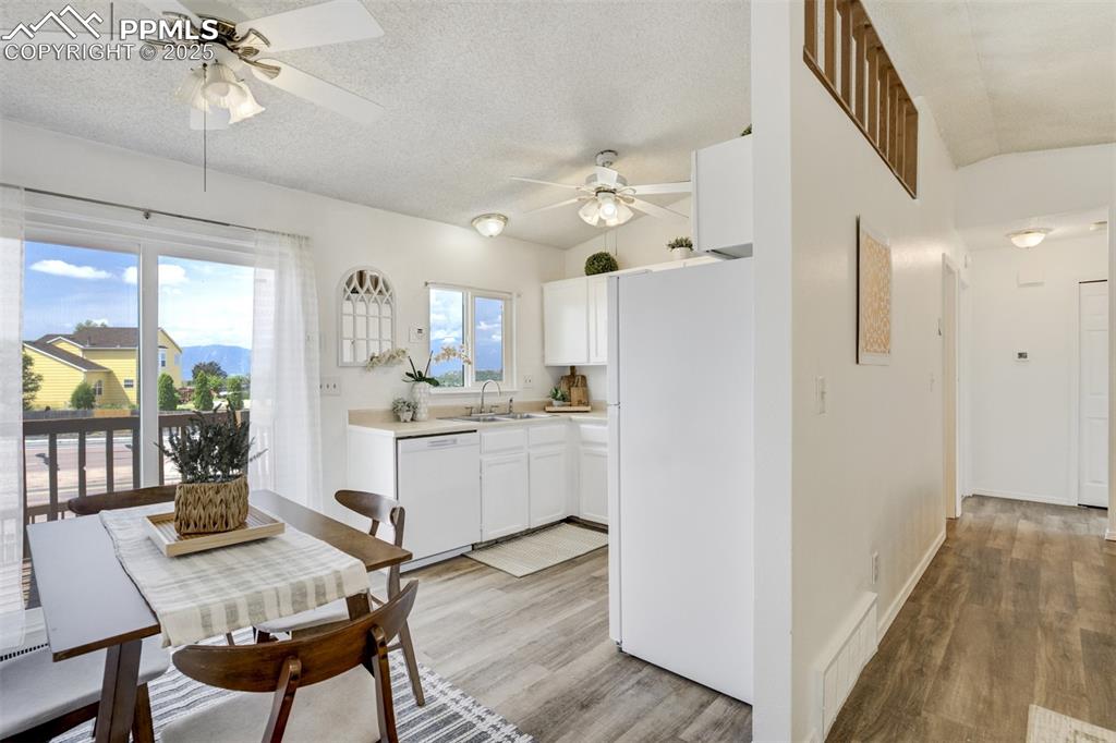 Image 7 of 33: LVP flooring stretches through the common living spaces...