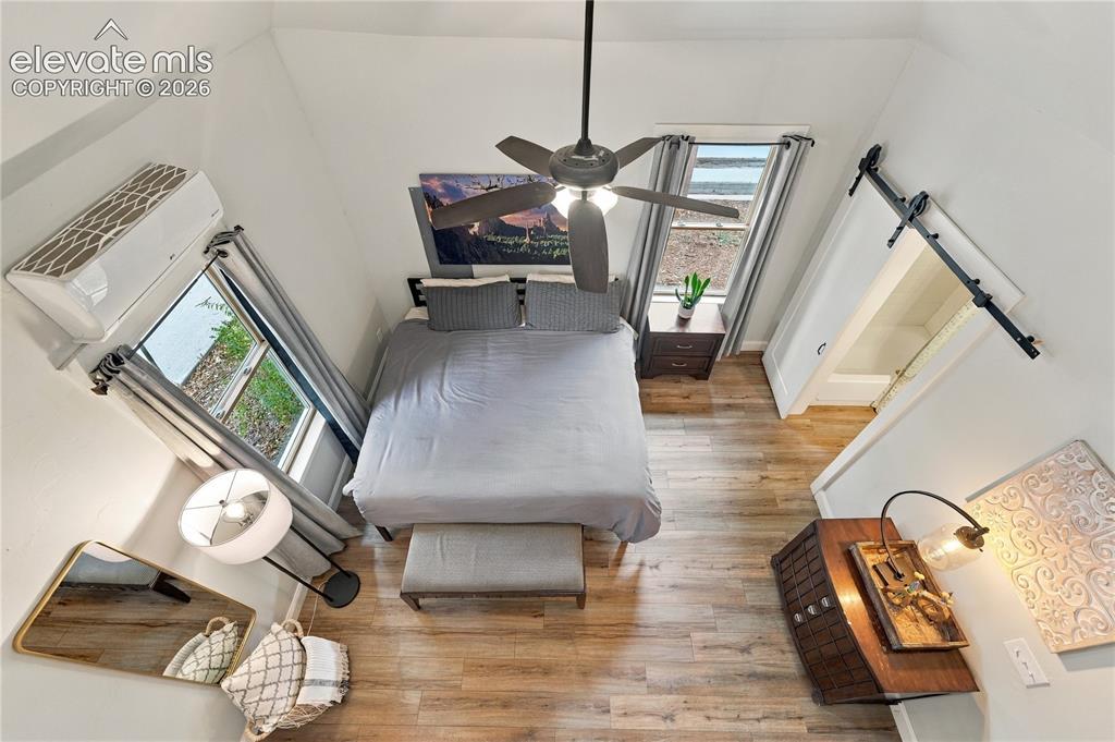 Image 42 of 50: View from the loft into the bedroom. 