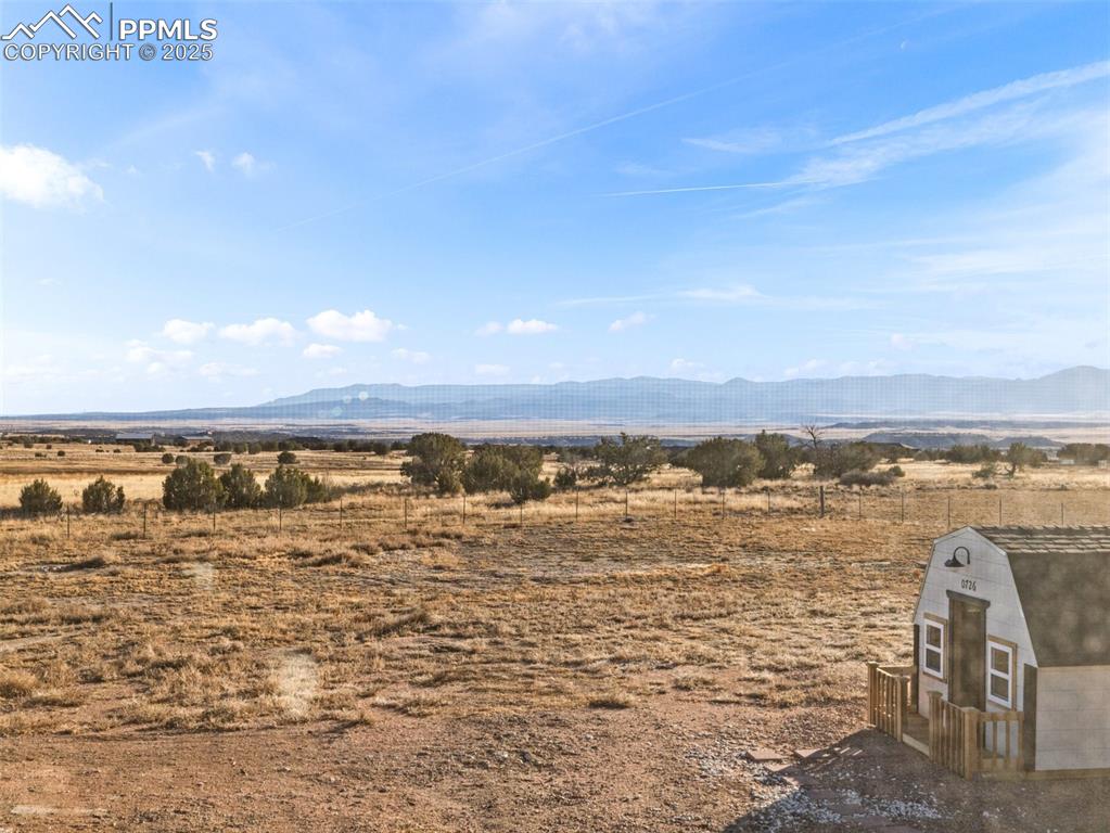Image 37 of 41: View of mountain background with rural landscape