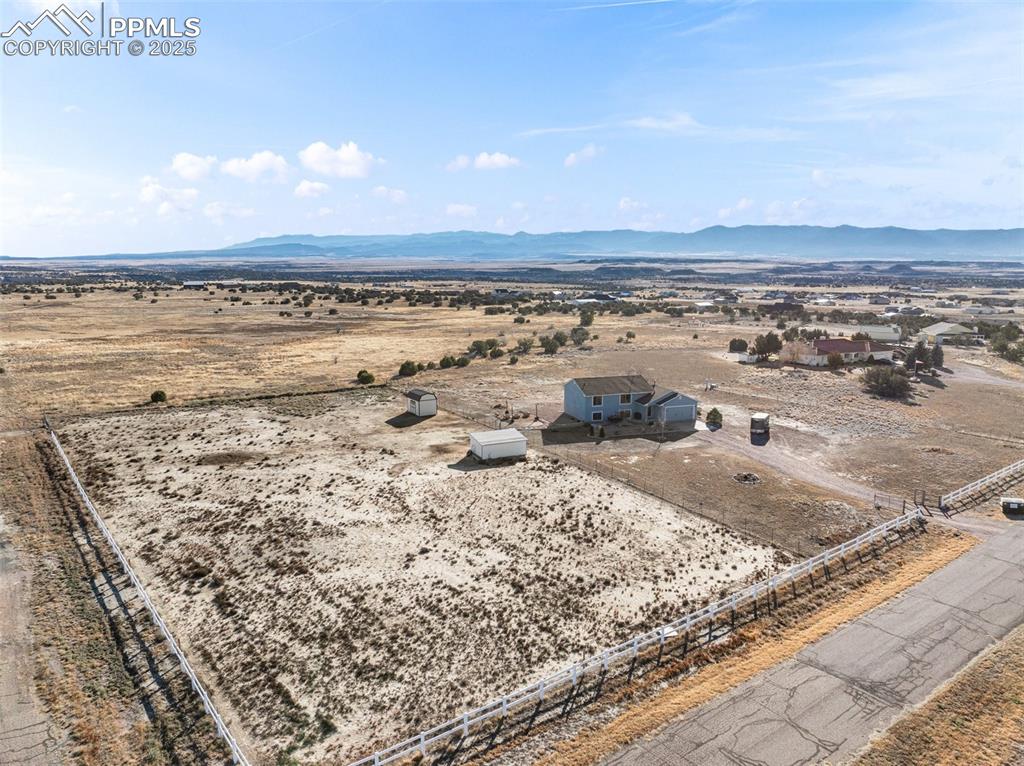 Image 5 of 41: View of rural area featuring mountains and a desert landscape