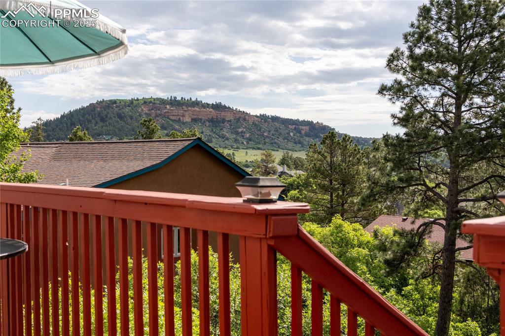 Image 10 of 38: Stunning views from the deck off of the kitchen and main-level bedroom