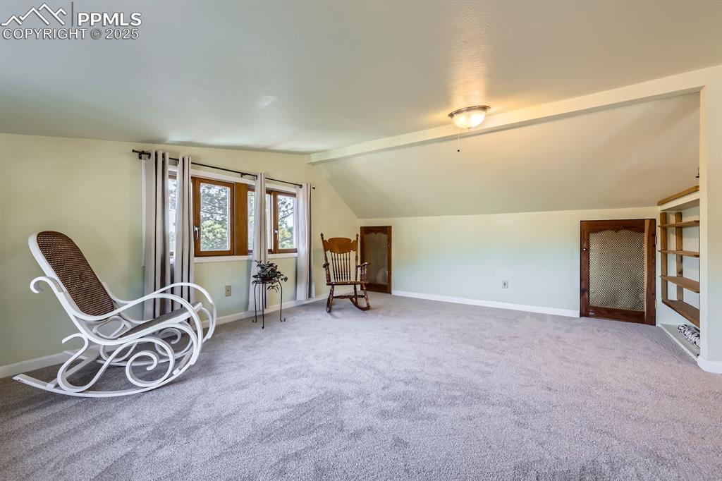 Image 20 of 38: Upper level loft/master bedroom