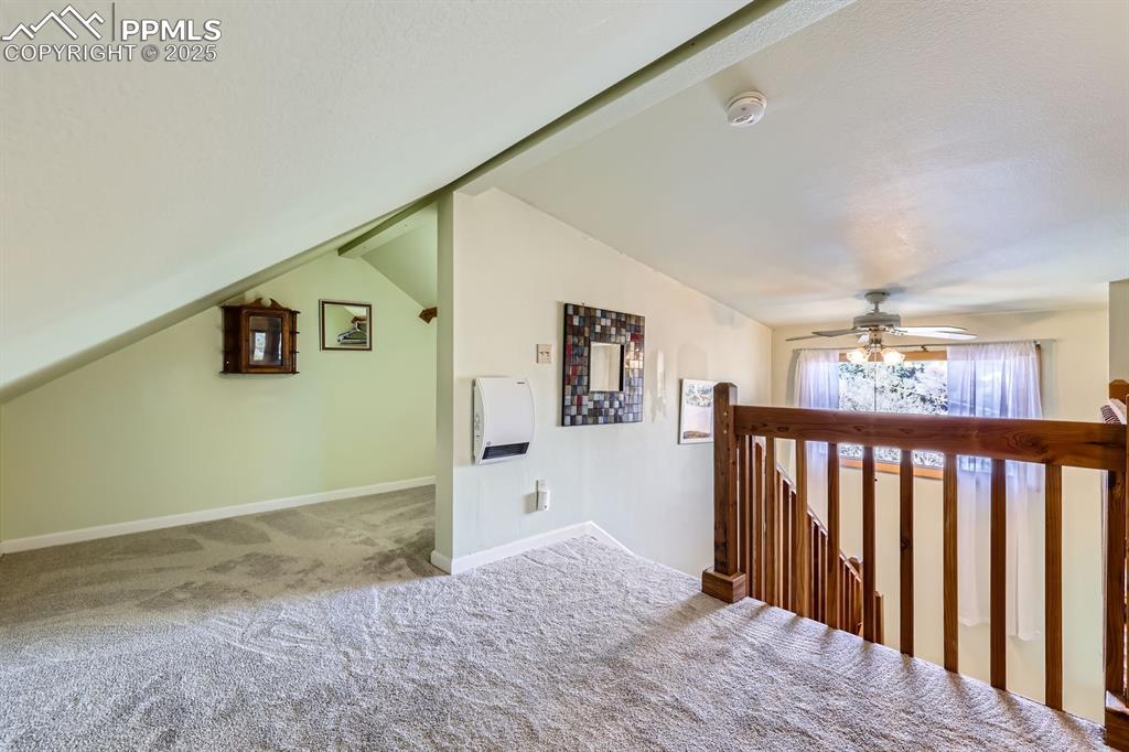Image 25 of 38: Upper level loft/master bedroom