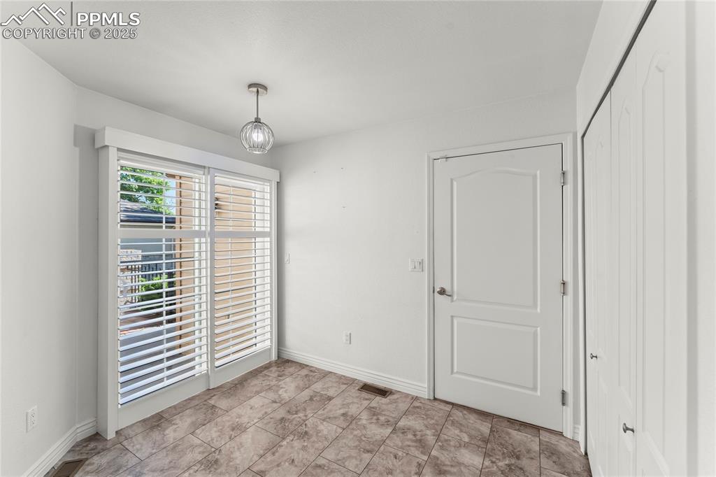 Image 28 of 50: Entrance into garage