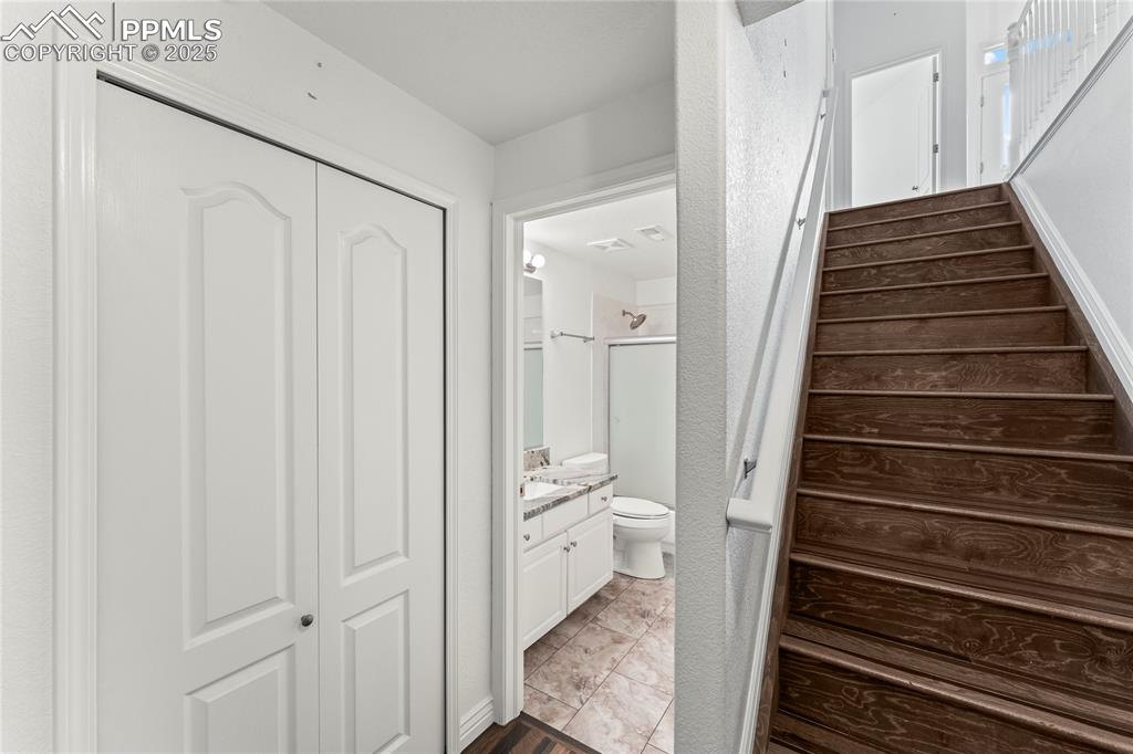 Image 30 of 50: Stairway with marble finish floors