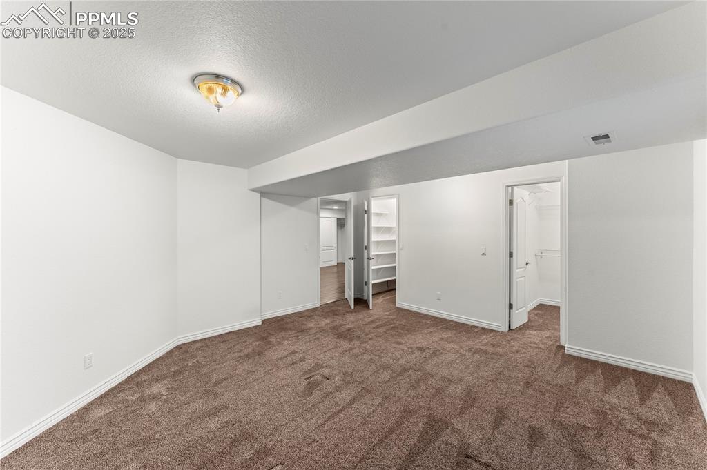 Image 39 of 50: Bedroom with two closet spaces