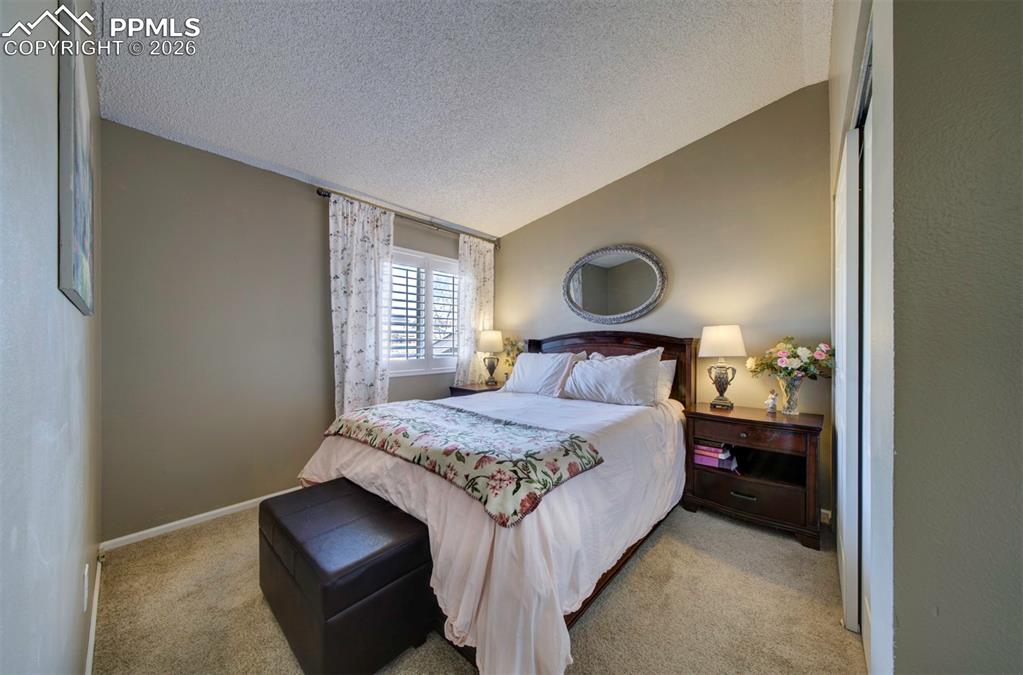 Image 12 of 19: Bedroom