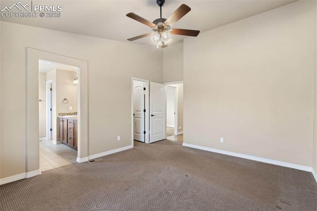 Image 13 of 36: Huge Walk in Closet!