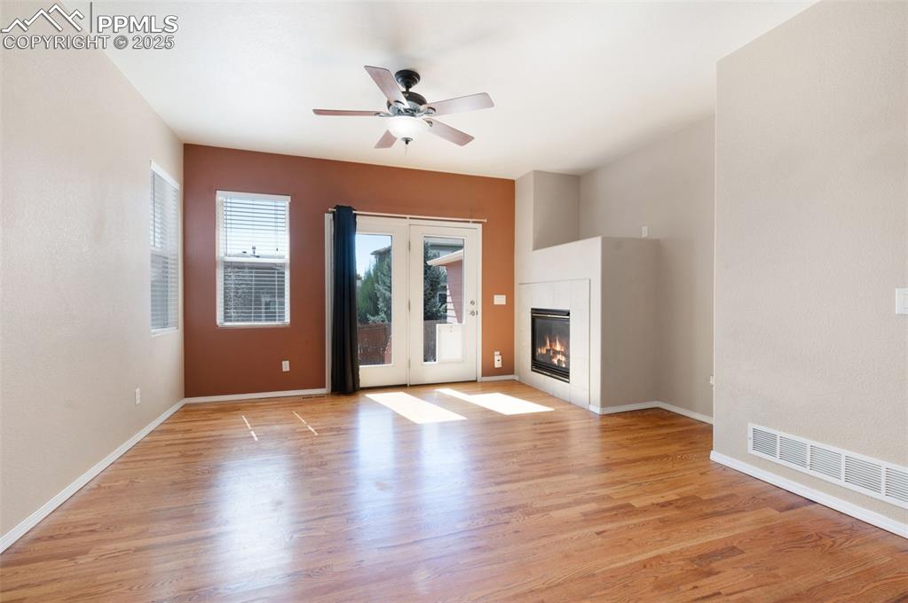Image 21 of 46: Kitchen featuring a breakfast bar area, a kitchen island, stainless steel a