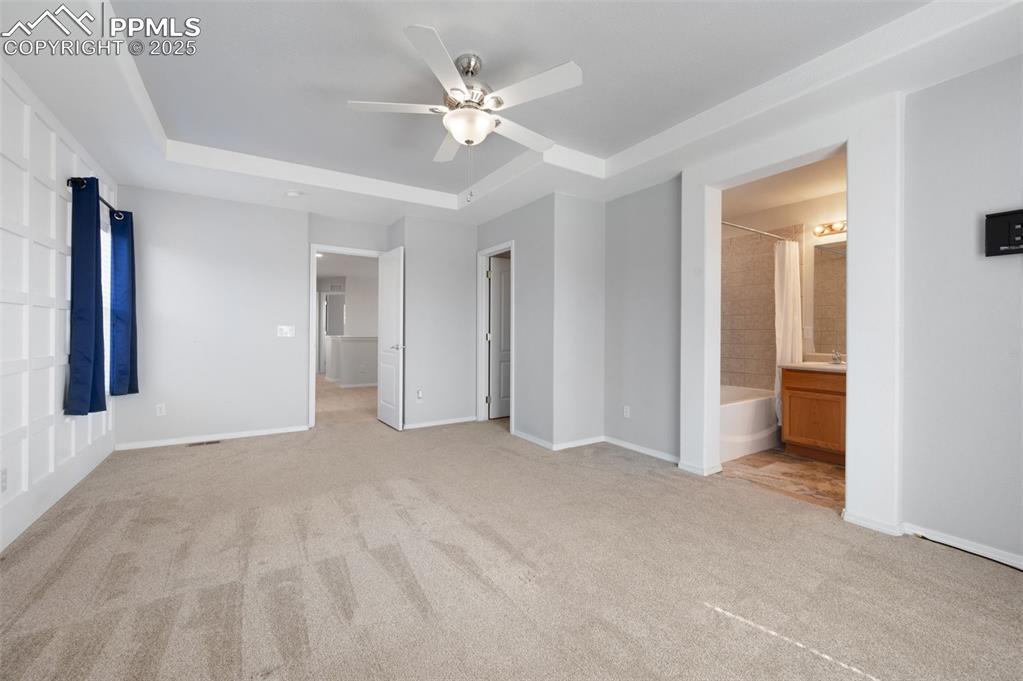 Image 28 of 46: Spacious closet with light wood-style floors
