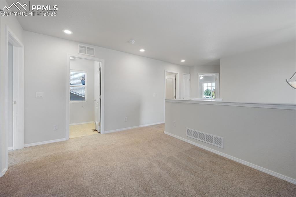 Image 32 of 46: Bathroom featuring shower / bathtub combination with curtain, double vanity