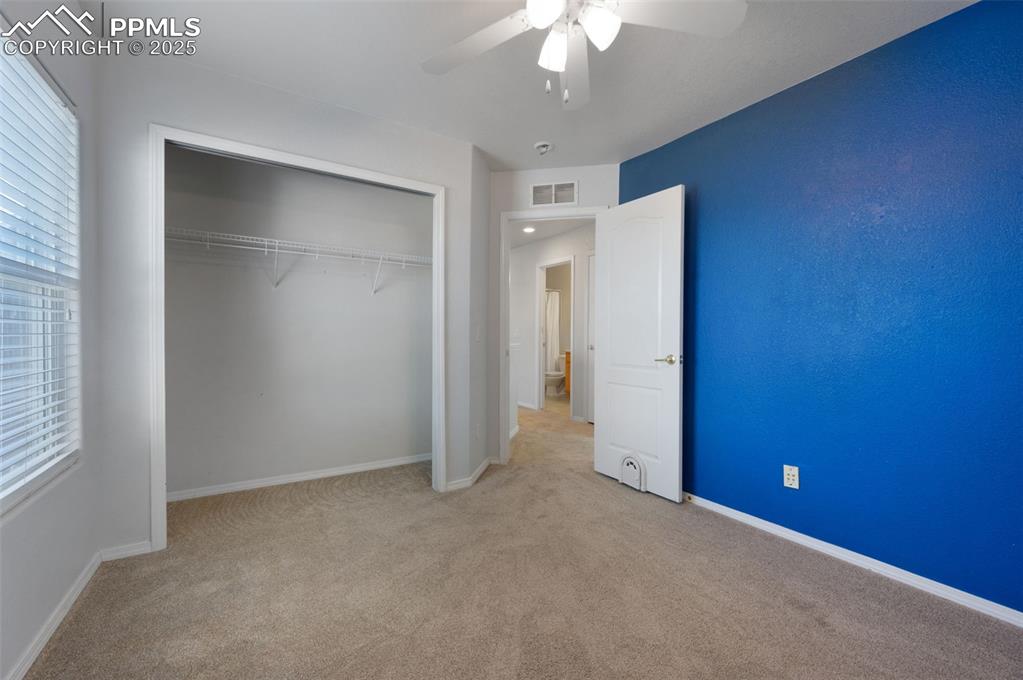 Image 38 of 46: Basement featuring light carpet