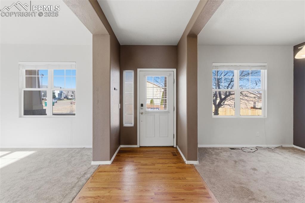 Image 9 of 46: Unfurnished room with light colored carpet and baseboards