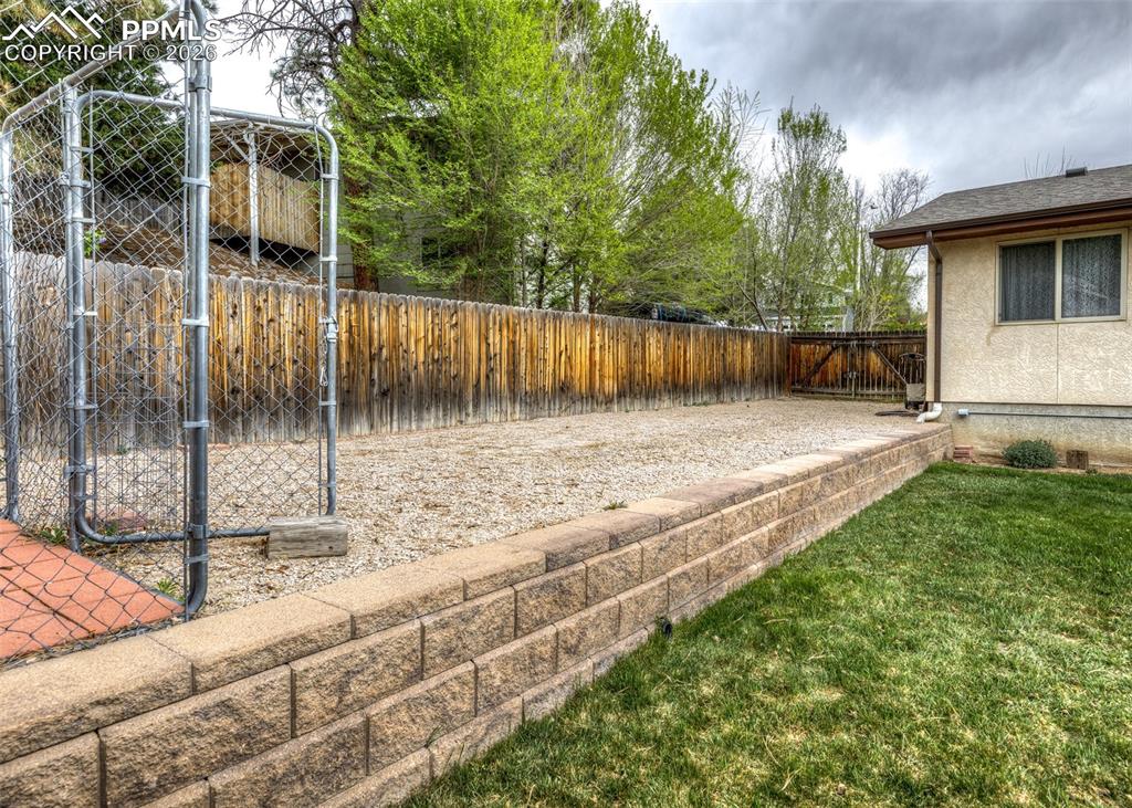 Image 38 of 41: Dog Area and RV Parking