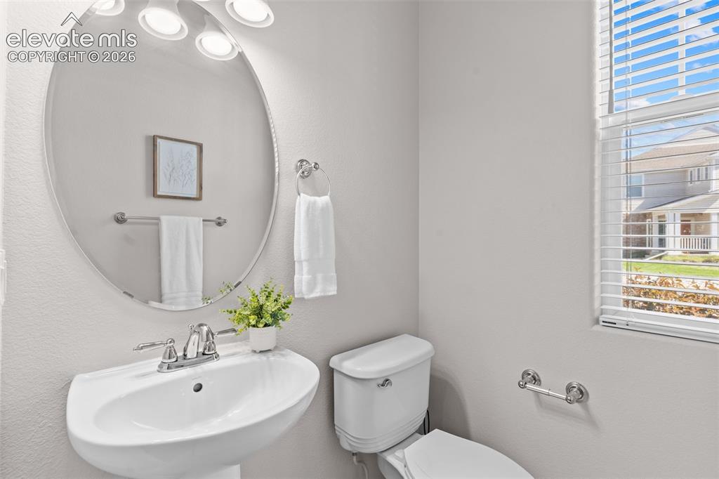 Image 13 of 33: Main level powder room