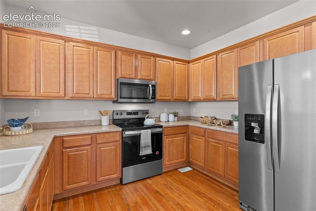 Image 9 of 33: Newer SS appliances