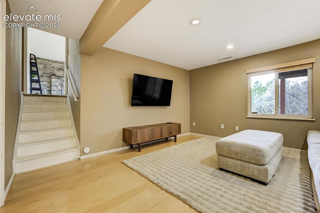 Image 23 of 38: The walkout basement brings in so much natural light, you may forget it’s t