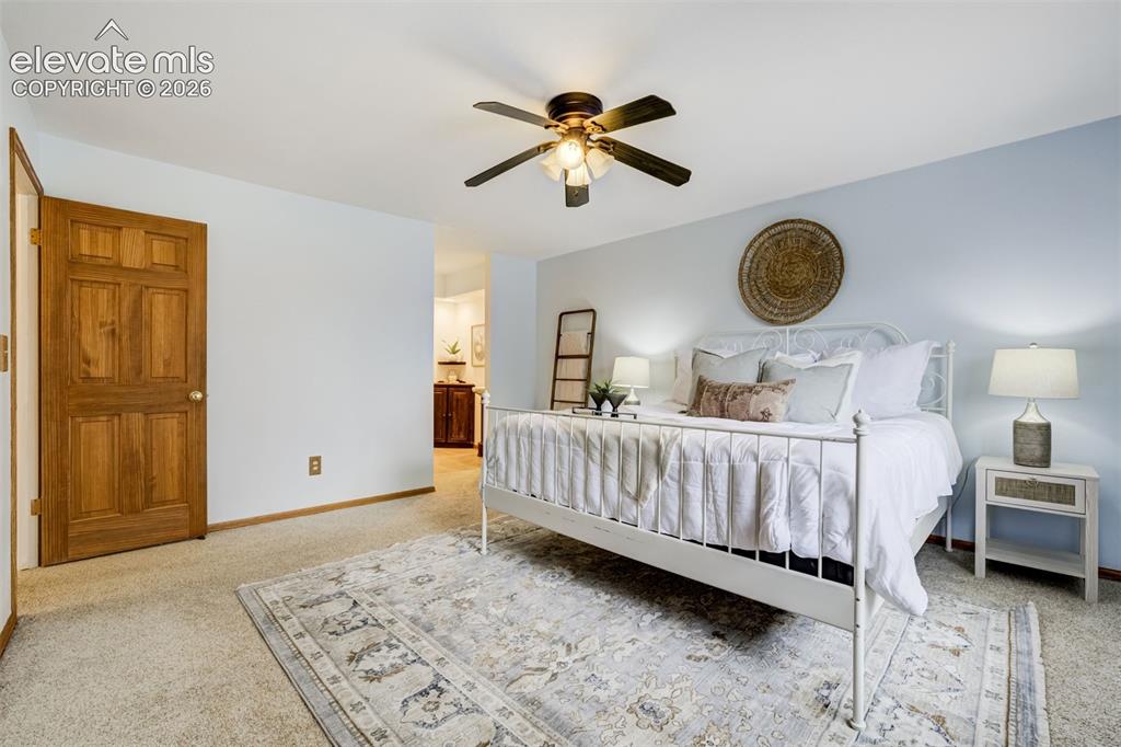 Image 26 of 38: Primary bedroom with an ensuite bathroom. 