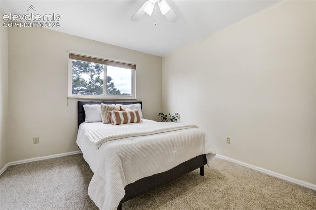 Image 31 of 38: Third bedroom upstairs, for a total of 4 bedrooms. 